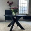 Alta- Round dining table with a stylish base and a durable design on which the table top rests. Veneered black stained oak. Insert plate 45cm x 2pcs. Height 76 cm.