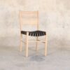 Idun- Stolen är en perfekt kombination av form och funktionalitet. Det höga ryggstödet och det mjuka svarta nylon bandet förstärker inte bara stolens estetik utan också dess komfort,  vilket ger stolens design en naturlig och varm känsla. Finns i flera färger: Whitewashed, smoked, svart, oljad ek. Sitt höjd 45cm. Monterad stol.